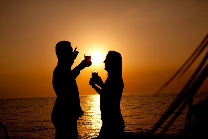 Antigua Sunset Catamaran Cruise From St. John's - Following the Antiguan coast by catamaran