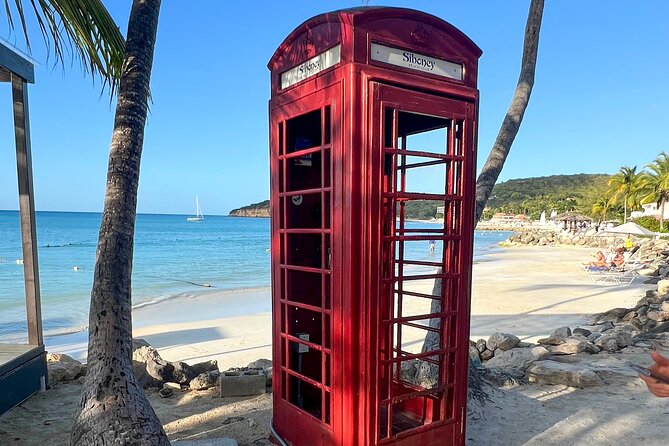 Famous Red Phone Booth Beach (Dickenson Bay) and Fort Bay Beach - Why the driver staying with you matters